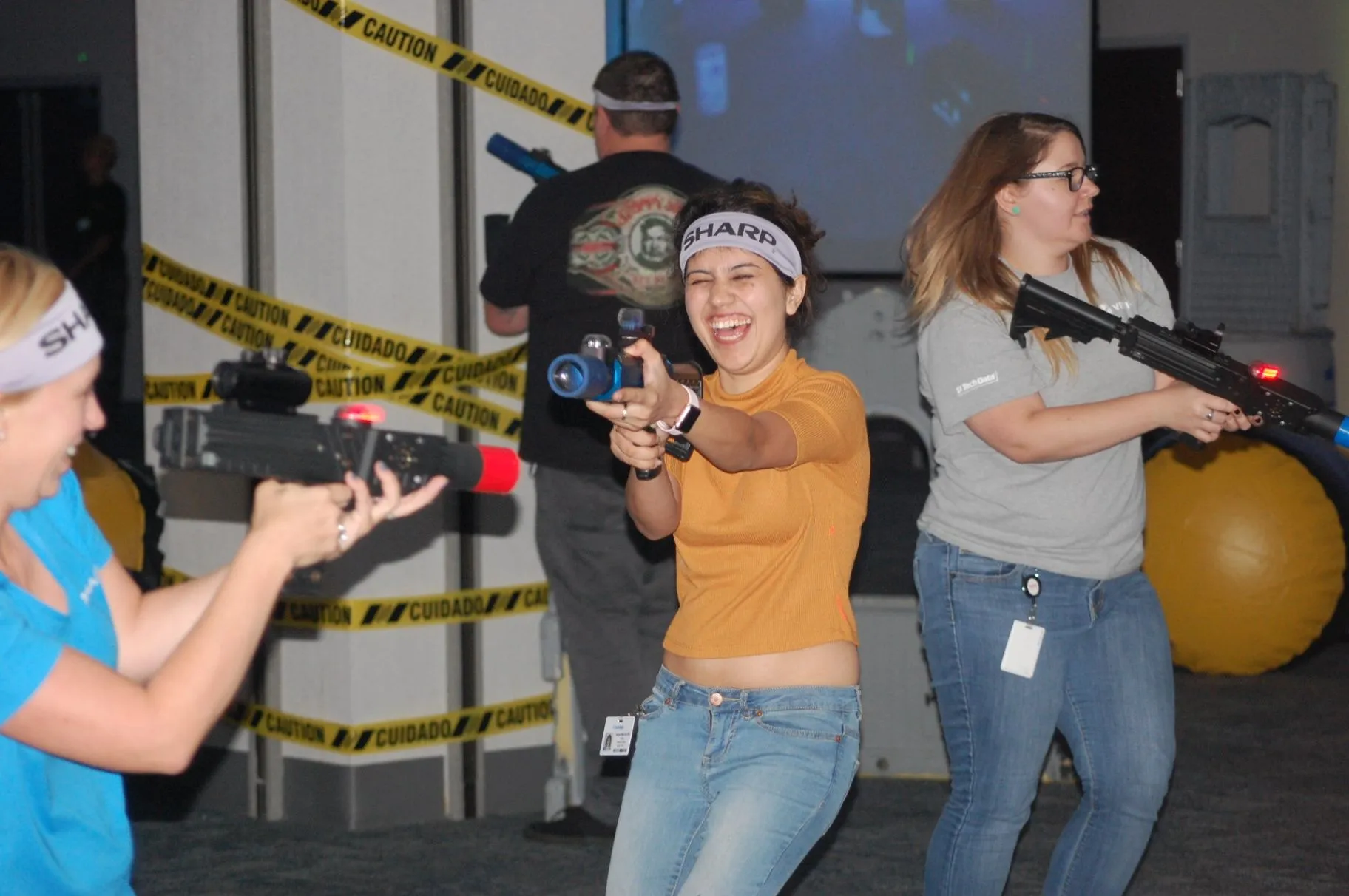 Players competing in an indoor laser tag arena